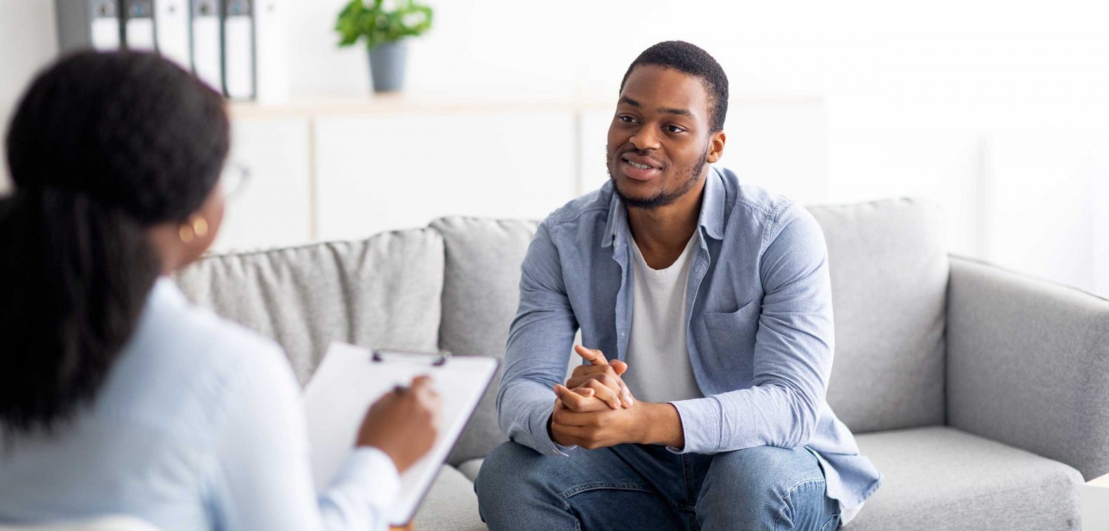 A man having a consultation with a therapist.